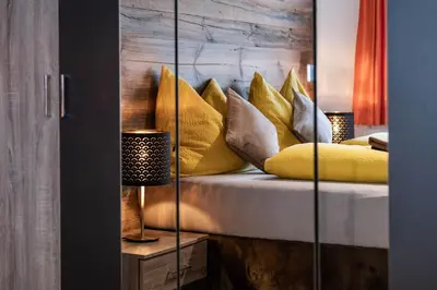Ein Bett oder Betten in einem Zimmer der Unterkunft Zillerstübchen