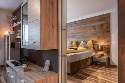 Ein Bett oder Betten in einem Zimmer der Unterkunft Zillerstübchen