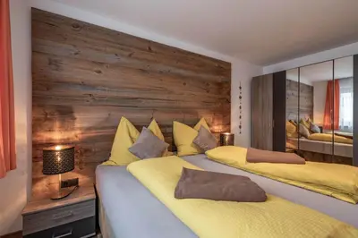 Ein Bett oder Betten in einem Zimmer der Unterkunft Zillerstübchen