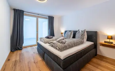 Ein Bett oder Betten in einem Zimmer der Unterkunft Apartment Foidl