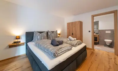 Ein Bett oder Betten in einem Zimmer der Unterkunft Apartment Foidl