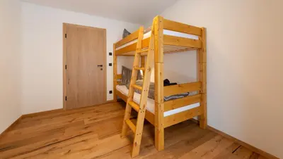 Ein Bett oder Betten in einem Zimmer der Unterkunft Apartment Foidl