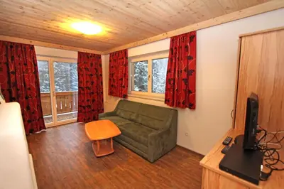 Ein Sitzbereich in der Unterkunft Ferienwohnung Königsleiten 2 - Top 3