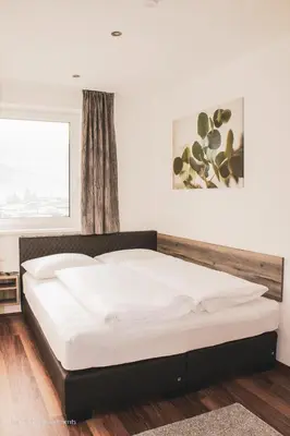 Ein Bett oder Betten in einem Zimmer der Unterkunft TheView Green