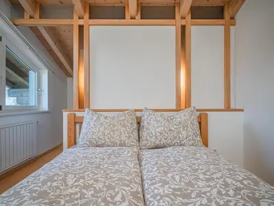 Ein Bett oder Betten in einem Zimmer der Unterkunft Haus Idylle am Berg