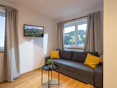Ein Sitzbereich in der Unterkunft Bergzeit Appartement