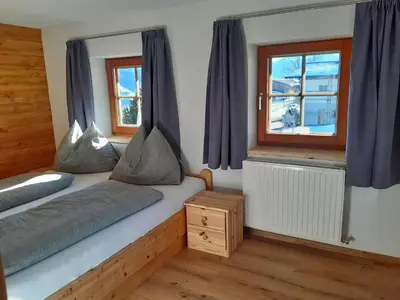 Ein Bett oder Betten in einem Zimmer der Unterkunft Ferienwohnung Schwalbennest