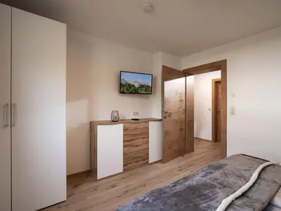 Ein Bett oder Betten in einem Zimmer der Unterkunft Bergpanorama Kössen