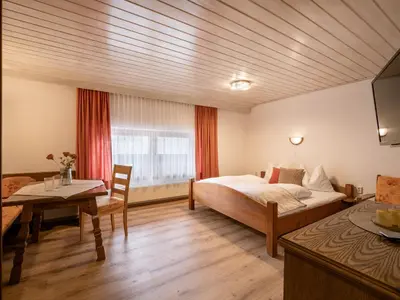 Ein Bett oder Betten in einem Zimmer der Unterkunft Bauernhof Hanslingerhof