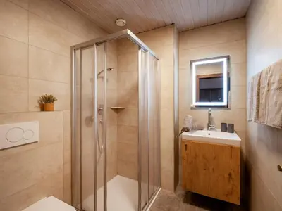 Ein Badezimmer in der Unterkunft Bauernhof Hanslingerhof
