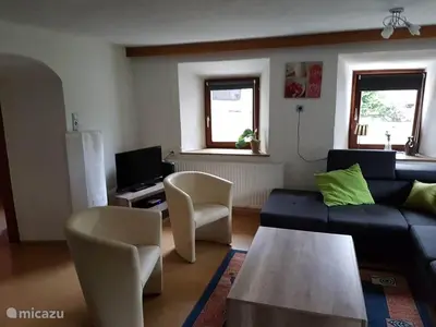 Ein Sitzbereich in der Unterkunft Haus Leonie