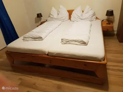 Ein Bett oder Betten in einem Zimmer der Unterkunft Haus Leonie