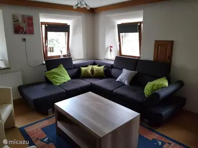 Ein Sitzbereich in der Unterkunft Haus Leonie