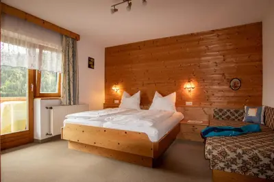 Ein Bett oder Betten in einem Zimmer der Unterkunft Christof,s Ferienwohnung WILD232