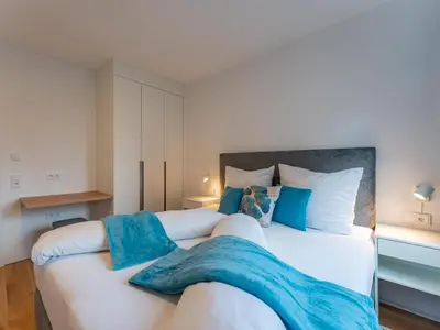 Ein Bett oder Betten in einem Zimmer der Unterkunft Ferienwohnung Emilia