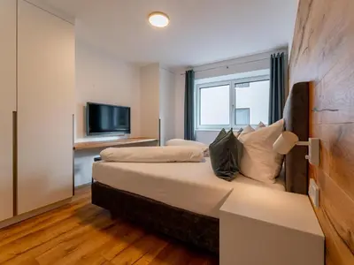 Ein Bett oder Betten in einem Zimmer der Unterkunft Ferienwohnung Emilia
