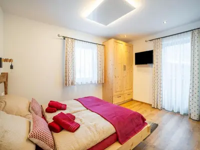 Ein Bett oder Betten in einem Zimmer der Unterkunft Chalet in Sulzau near Wildkogel Ski Arena