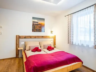 Ein Bett oder Betten in einem Zimmer der Unterkunft Chalet in Sulzau near Wildkogel Ski Arena