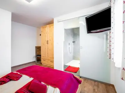 Ein Bett oder Betten in einem Zimmer der Unterkunft Chalet in Sulzau near Wildkogel Ski Arena