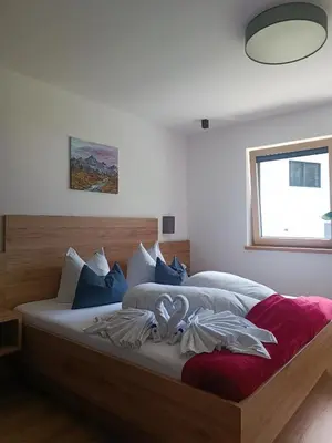 Ein Bett oder Betten in einem Zimmer der Unterkunft Alpenoase Horbergbahn