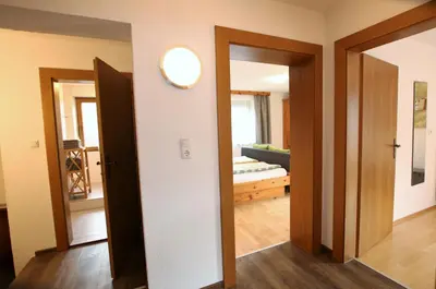 Ein Bett oder Betten in einem Zimmer der Unterkunft Raffeiner Ferienappartement Zillertal UDEZ100