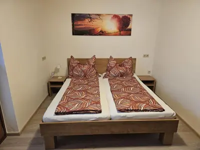 Ein Bett oder Betten in einem Zimmer der Unterkunft Raffeiner Ferienappartement Zillertal UDEZ100