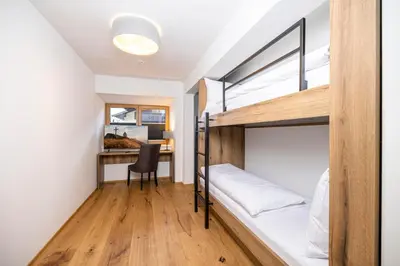 Ein Bett oder Betten in einem Zimmer der Unterkunft Apartments Austria