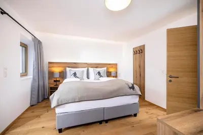 Ein Bett oder Betten in einem Zimmer der Unterkunft Apartments Austria