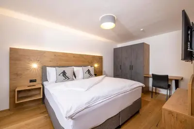 Ein Bett oder Betten in einem Zimmer der Unterkunft Apartments Austria