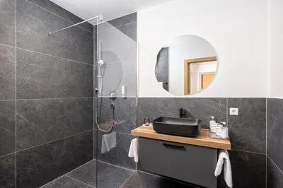 Ein Badezimmer in der Unterkunft Apartments Austria