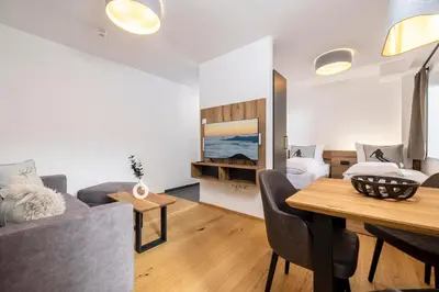 Ein Bett oder Betten in einem Zimmer der Unterkunft Apartments Austria