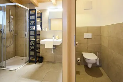 Ein Badezimmer in der Unterkunft Filzsteinresort Chalets - Chalet 235