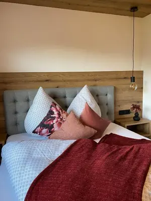 Ein Bett oder Betten in einem Zimmer der Unterkunft Apart Helena