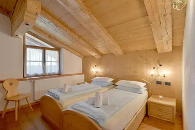 Ein Bett oder Betten in einem Zimmer der Unterkunft Wilder Kaiser by Apartment Managers