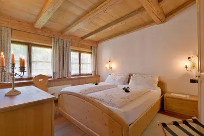 Ein Bett oder Betten in einem Zimmer der Unterkunft Wilder Kaiser by Apartment Managers