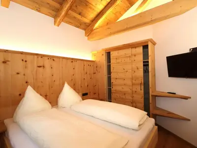 Ein Bett oder Betten in einem Zimmer der Unterkunft Chalet Höllwarth
