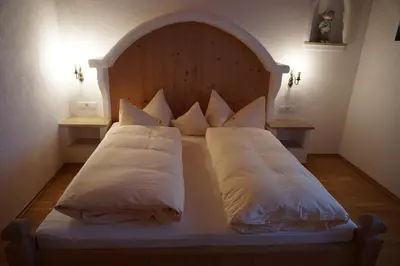 Ein Bett oder Betten in einem Zimmer der Unterkunft Apart Martha