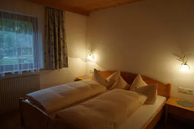 Ein Bett oder Betten in einem Zimmer der Unterkunft Apart Martha