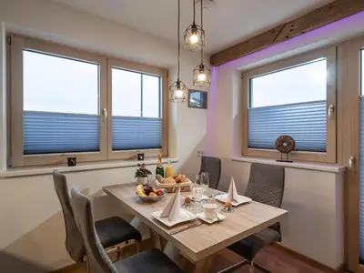 Ein Sitzbereich in der Unterkunft Apartment Filzenkogel