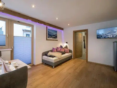 Ein Sitzbereich in der Unterkunft Apartment Filzenkogel