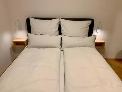 Ein Bett oder Betten in einem Zimmer der Unterkunft Wohnung Gundhabing