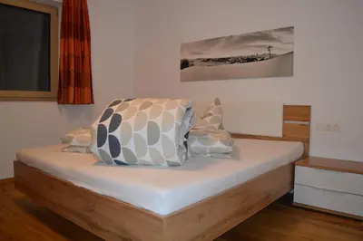 Ein Bett oder Betten in einem Zimmer der Unterkunft Appartement Dorfblick