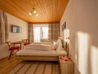 Ein Bett oder Betten in einem Zimmer der Unterkunft Ferienwohnung Krimbacher