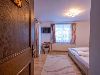 Ein Bett oder Betten in einem Zimmer der Unterkunft Ferienwohnung Krimbacher