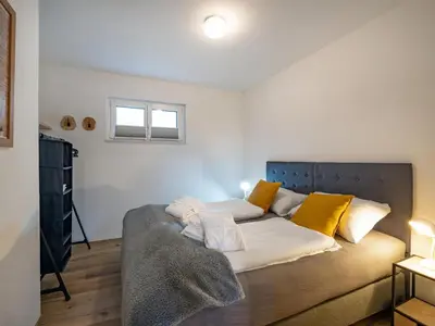 Ein Bett oder Betten in einem Zimmer der Unterkunft App Neuschmid