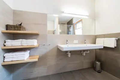 Ein Badezimmer in der Unterkunft Haus Mühlleiten