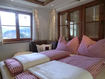 Ein Bett oder Betten in einem Zimmer der Unterkunft Apartment-Chalet Mödlinghof