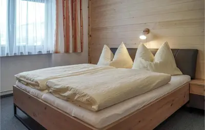 Ein Bett oder Betten in einem Zimmer der Unterkunft Ferienwohnung - Hochgallzein