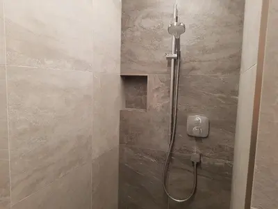 Ein Badezimmer in der Unterkunft Ferienwohnung Julia Pillerseetal