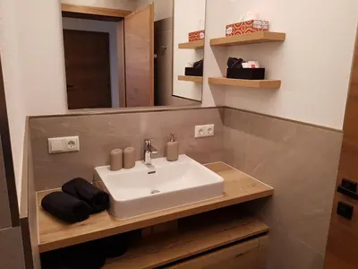 Ein Badezimmer in der Unterkunft Ferienwohnung Julia Pillerseetal